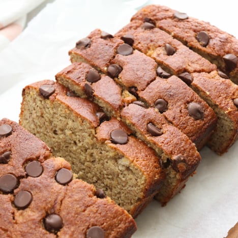 almond flour banana bread sliced and topped with chocolate chips.