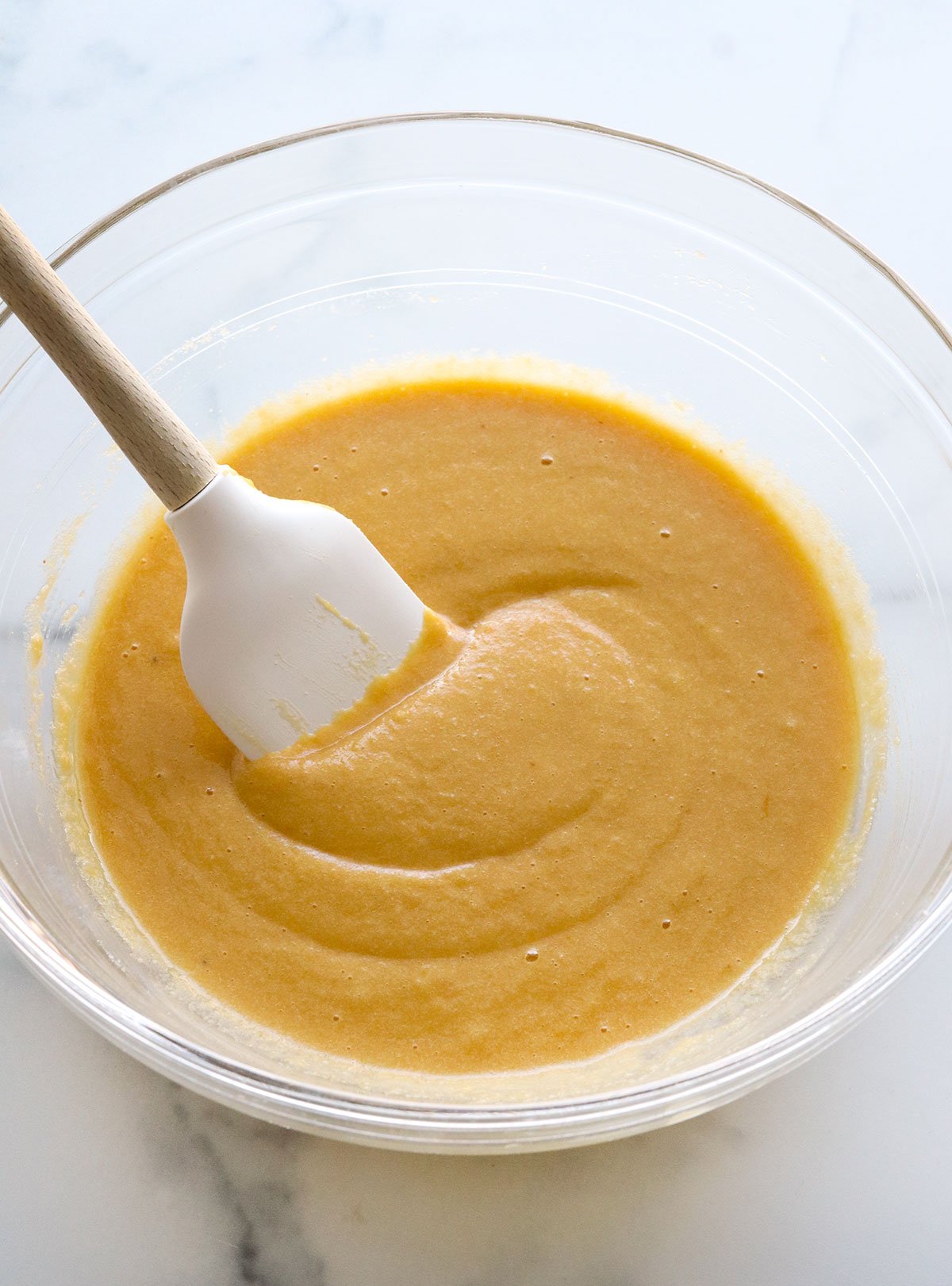 almond flour cake batter mixed in a large bowl.