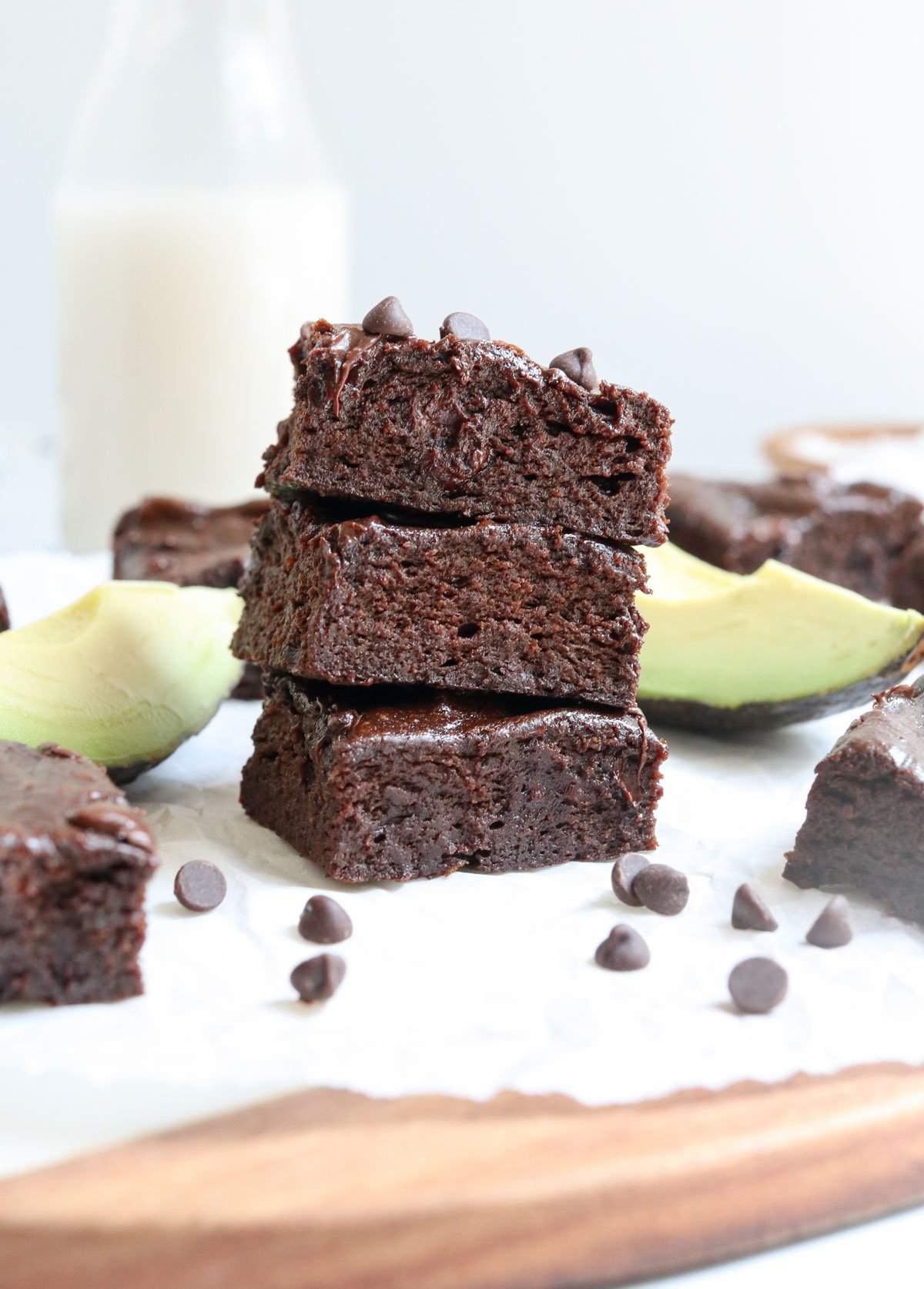 avocado brownies stacked on cutting board