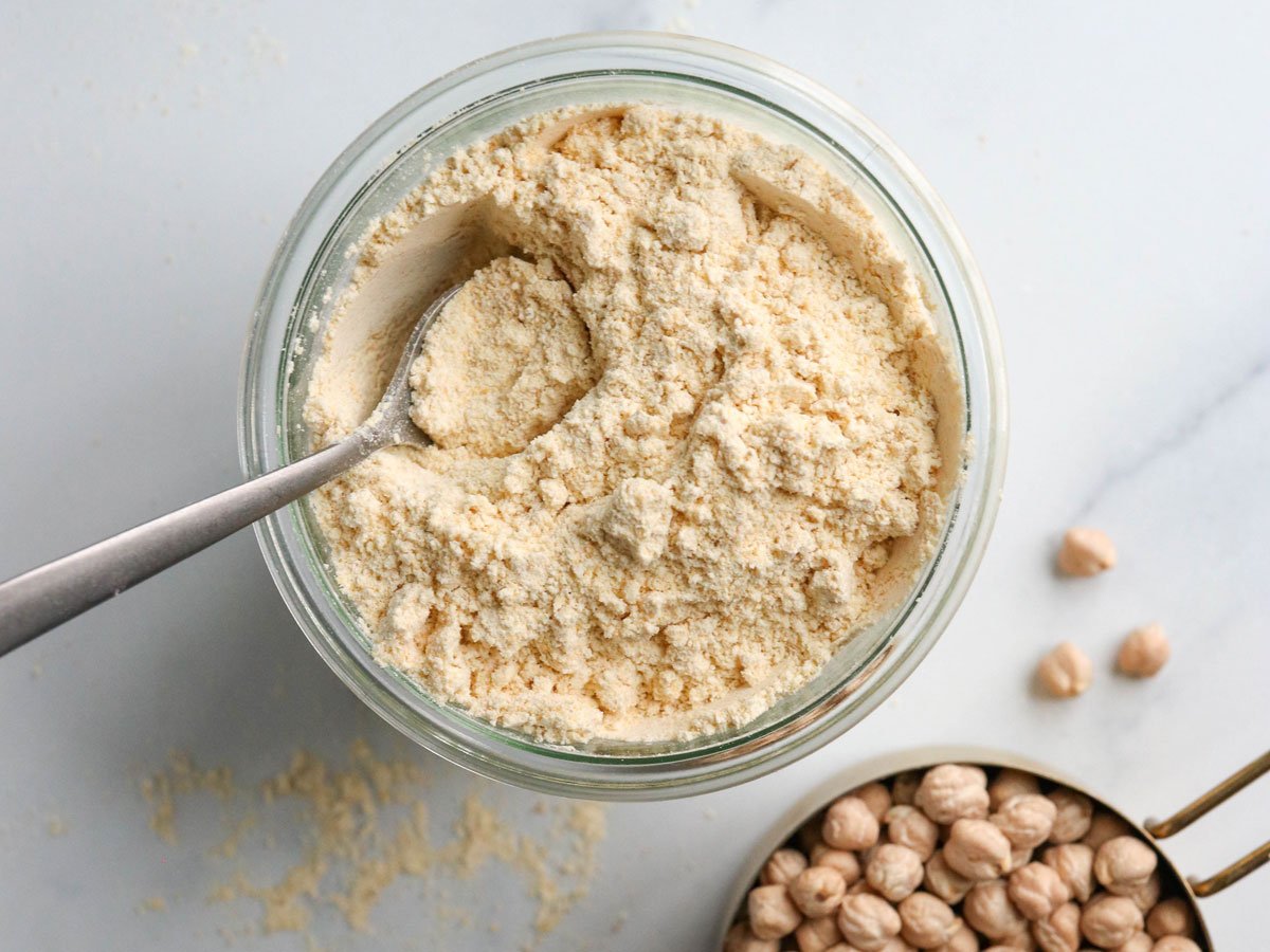 chickpea flour overhead in glass storage jar