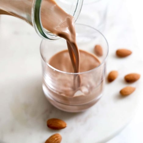 chocolate almond milk poured into glass