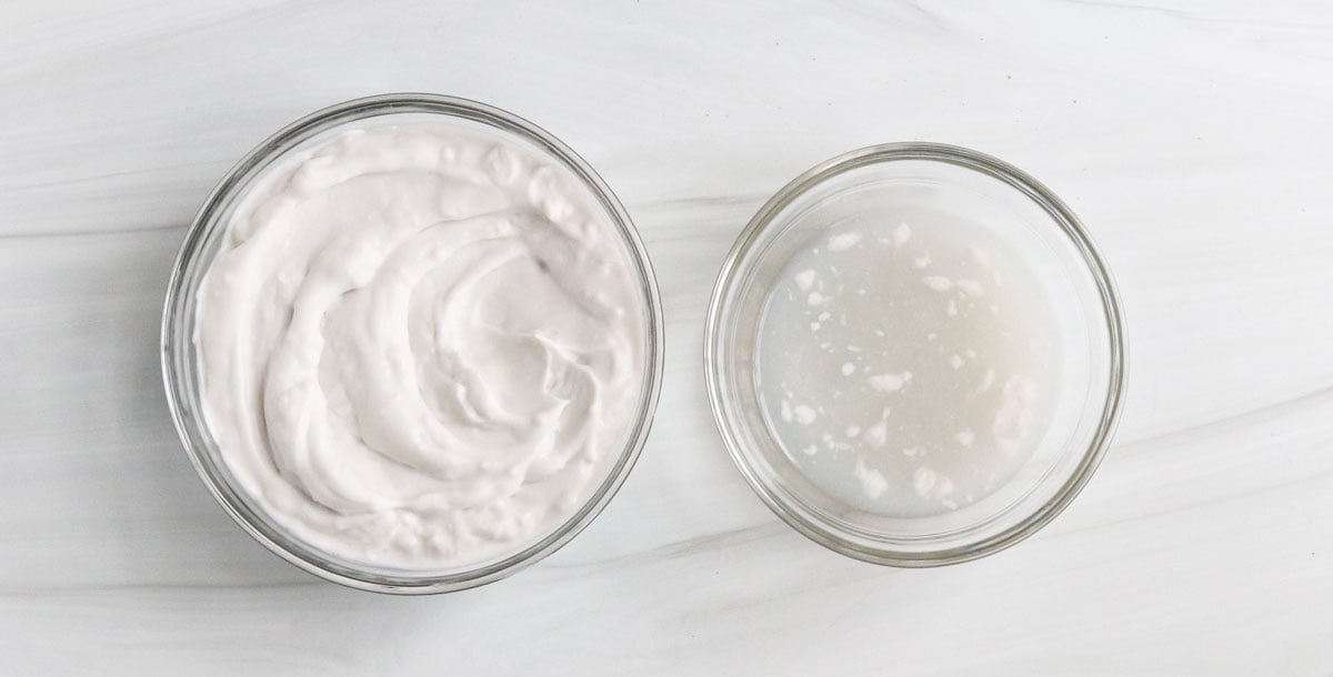 coconut cream and liquid in 2 glass bowls.