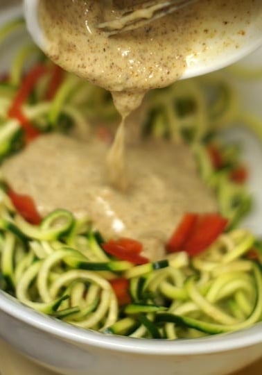 Sauce poured over zucchini noodles