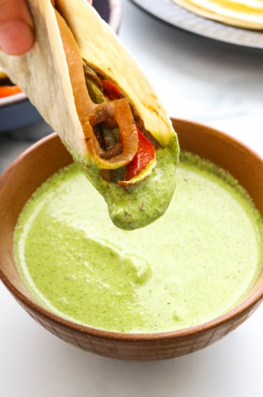 Vegan Fajita dipped in creamy cilantro sauce.