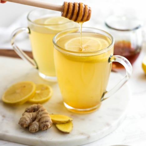 honey added to cup of ginger tea