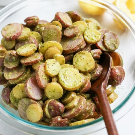 healthy potato salad in glass bowl.