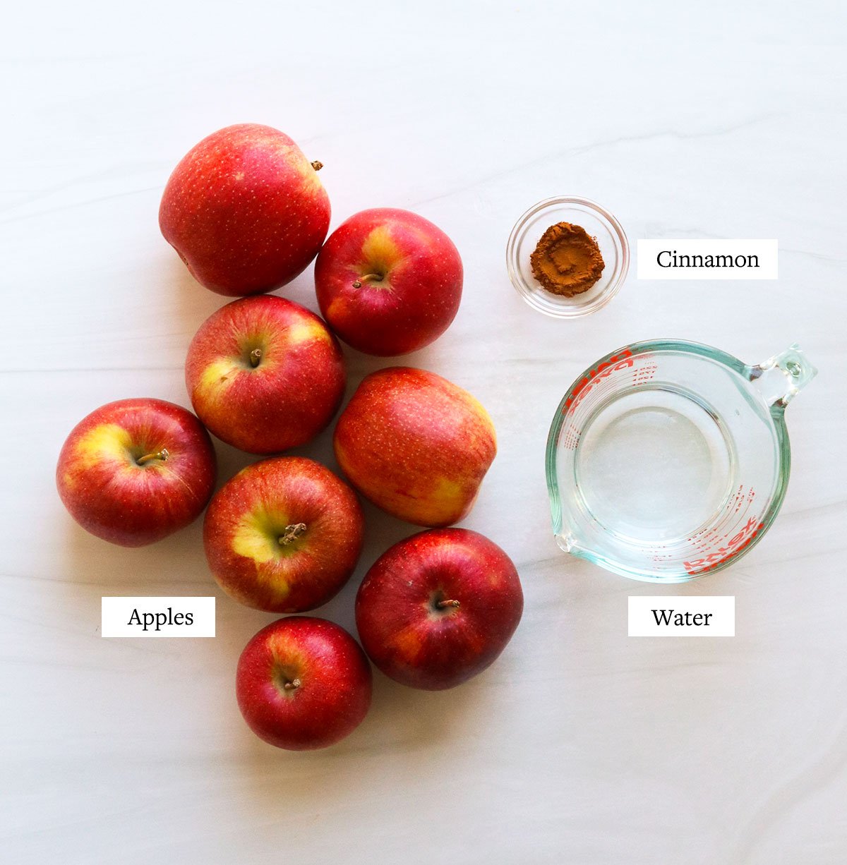 applesauce ingredients labeled on a white surface.