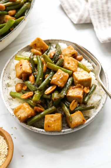 kung pao tofu served over white rice.