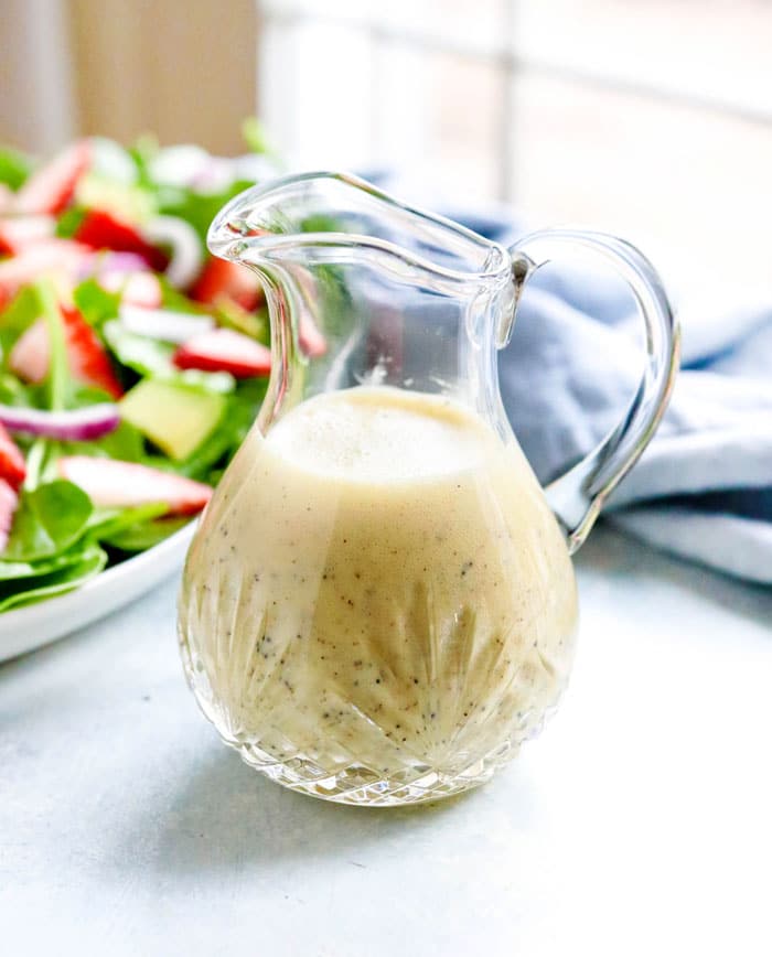 lemon poppy seed dressing in glass jar