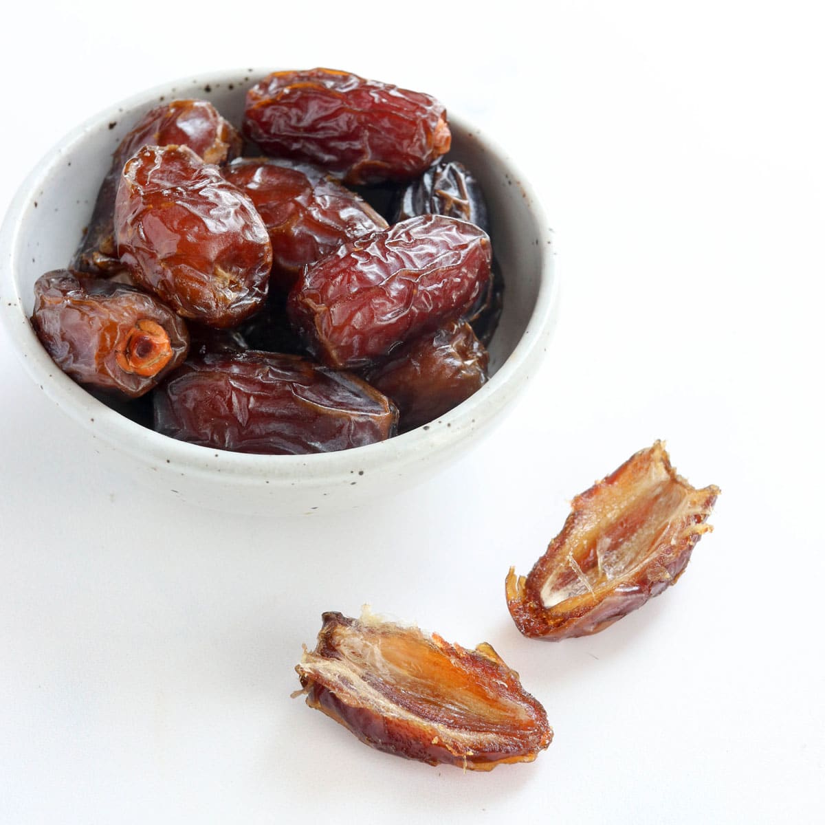 medjool dates in white bowl