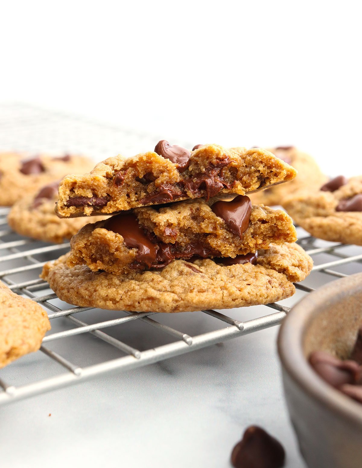 oat flour cookie split in half on rack.