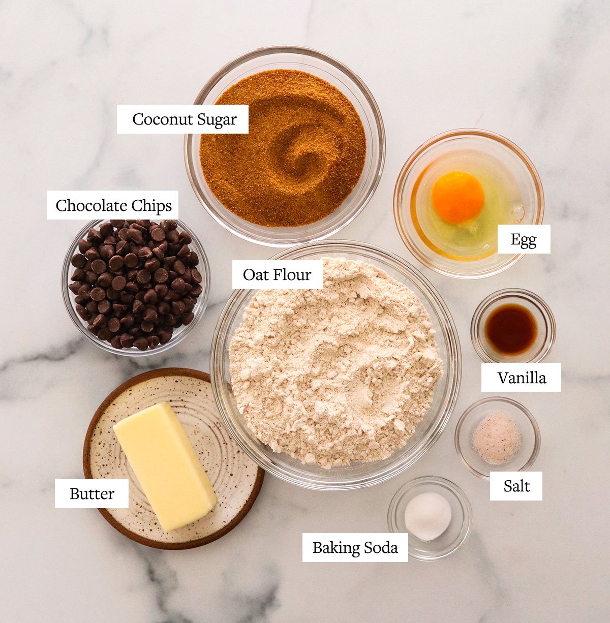 oat flour ingredients labeled in glass bowls.