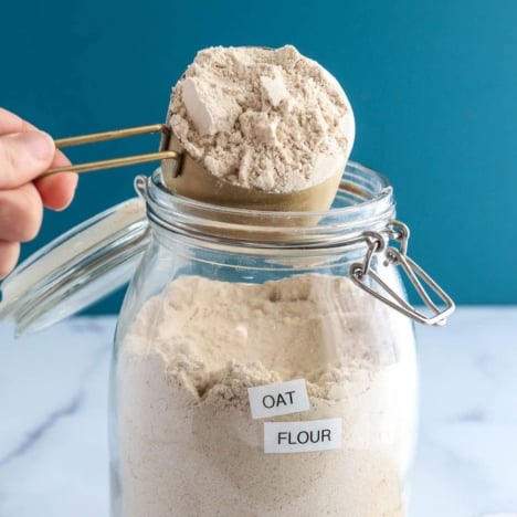 oat flour on blue background