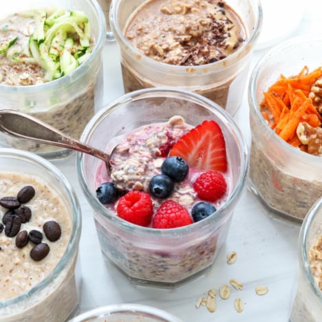 overnight oats with different toppings and flavors in glass jars