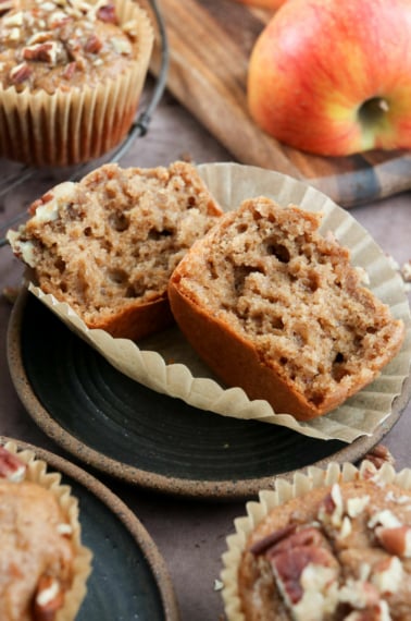 apple spice muffin split in half on plate