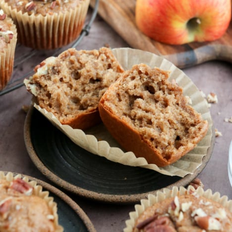 apple spice muffin split in half on plate