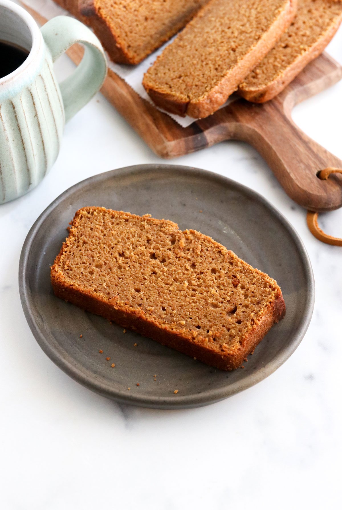 slice of pumpkin bread on black plate