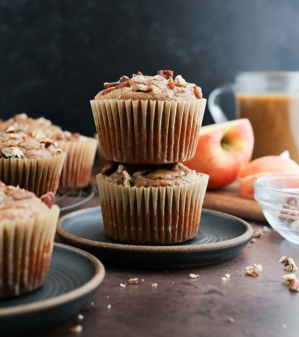 paleo muffins stacked on black plate