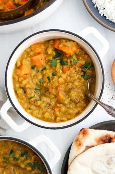 sweet potato curry with spoon in small bowl