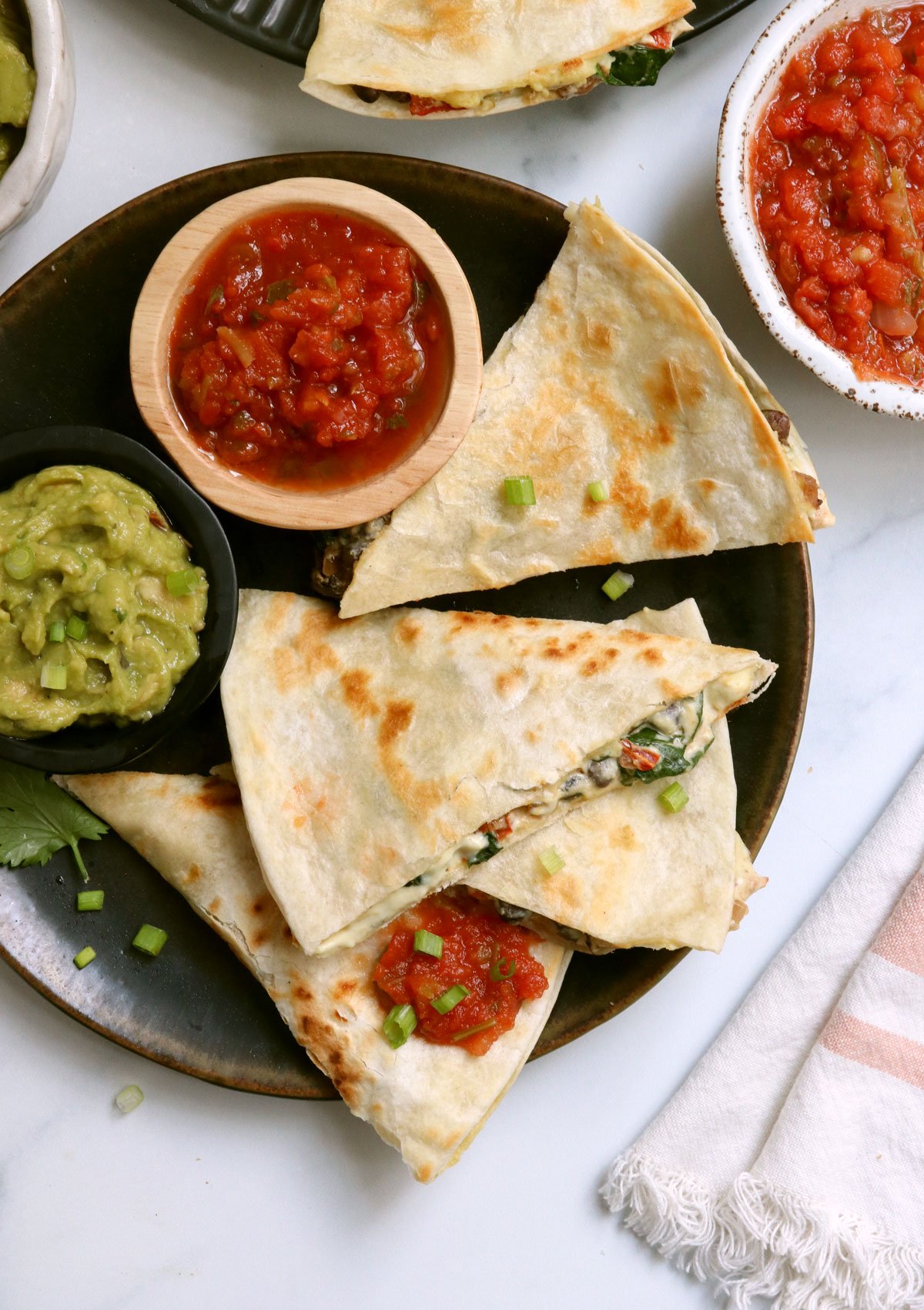 vegan quesadillas sliced into triangles