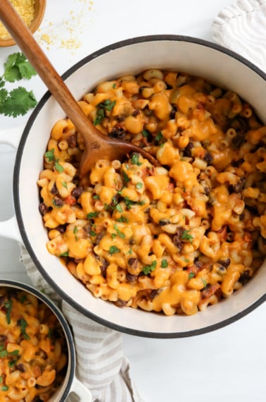 vegan sweet potato mac and cheese in white pot.