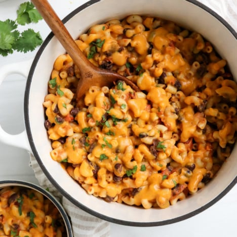 vegan sweet potato mac and cheese in white pot.