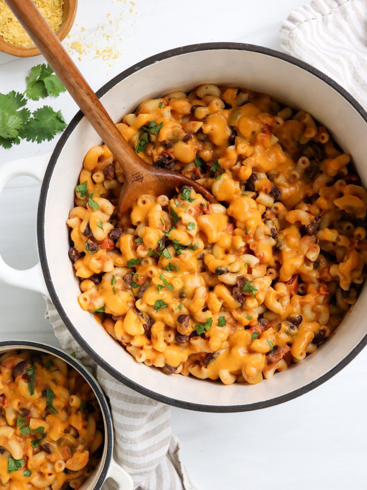 vegan sweet potato mac and cheese in white pot.